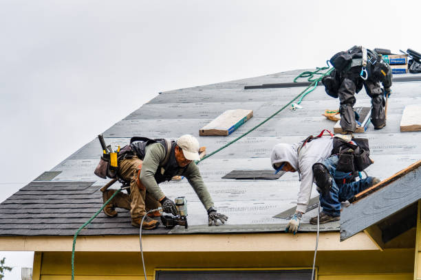 Professional Gutter Installation technician working in Upton, MA
